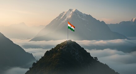 Majestic Mountain Peak with Indian Flag Above Clouds at Sunrise