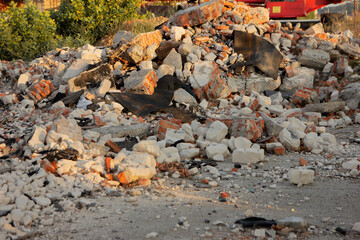construction waste. A pile of red bricks.