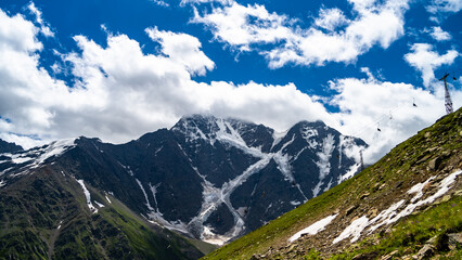 rocky mountain peaks in the clouds. cloud cover in the mountains