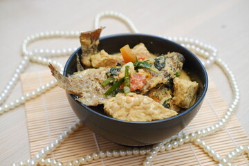 Traditional Fish and Tempeh in Spiced Coconut Sauce