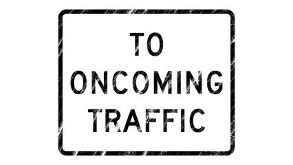 Vintage road sign warning about oncoming traffic movement