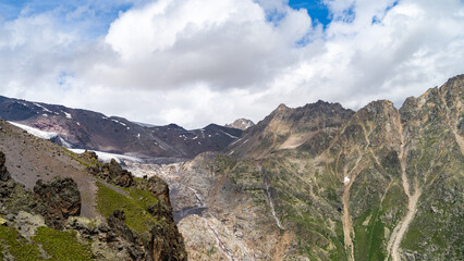 rocky mountain peaks in the clouds. cloud cover in the mountains