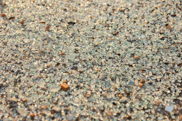Broken glass. Construction waste. Construction site consequences. Glass chips