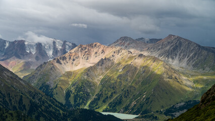 Fototapeta premium rocky mountain peaks in the clouds. cloud cover in the mountains