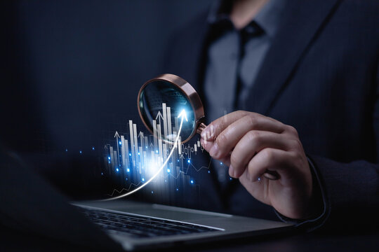 Shows stock ghaph on the laptop screen. Businessmen investor think before buying stock market investment, Analysis finance grow and exchange financial growth diagram. stock, market, invest