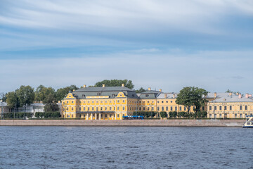 Beautiful view of historic yellow building along the Neva River in Saint Petersburg during a clear day