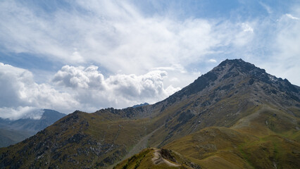rocky mountain peaks in the clouds. cloud cover in the mountains