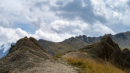 rocky mountain peaks in the clouds. cloud cover in the mountains