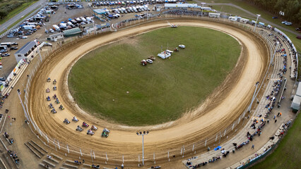 Aerial view of a vibrant motor racing speedway with racing cars and enthusiastic spectators, Richmond, Tasman, New Zealand.