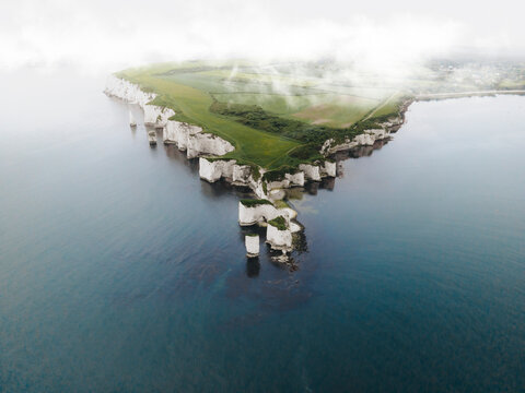 Aerial view of old harry rocks with majestic cliffs and tranquil sea, Studland, England, United Kingdom.