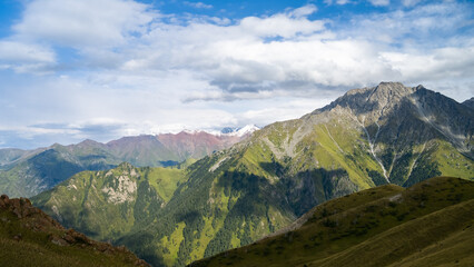 Obraz premium rocky mountain peaks in the clouds. cloud cover in the mountains