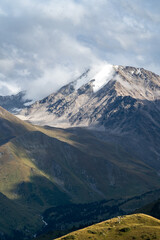 rocky mountain peaks in the clouds. cloud cover in the mountains