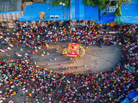 Chittagong, Bangladesh - 20 June 2023: Aerial view of vibrant crowd celebrating Rath Yatra festival with colorful procession, Chittagong, Chittagong, Bangladesh.