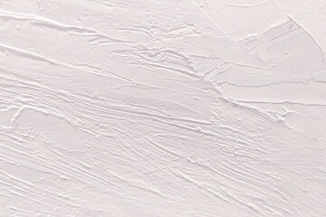 Rough large light brushstrokes of oil paint on canvas. Artistic vintage background