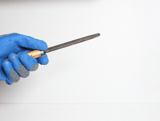 Fototapeta premium file in the hand in a blue glove