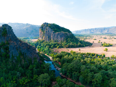 Aerial drone view of limstone mountain in Kong Lor valley, Laos, Southeast Asia