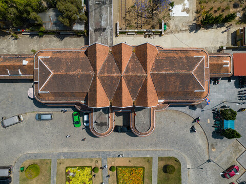 Aerial view of colorful urban architecture with symmetrical buildings and lush gardens, Ward 10, Da Lat, Lam Dong, Vietnam.