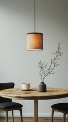 Cozy dining area featuring a simple wooden table, elegant pendant light, and minimalist decor in a modern home