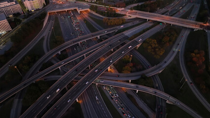 Aerial view of busy highway interchange with traffic and city lights at night, Downtown Atlanta, Georgia, United States.