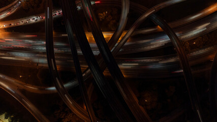 Aerial view of busy highway interchange with traffic and city lights at night, Atlanta, Georgia, United States.