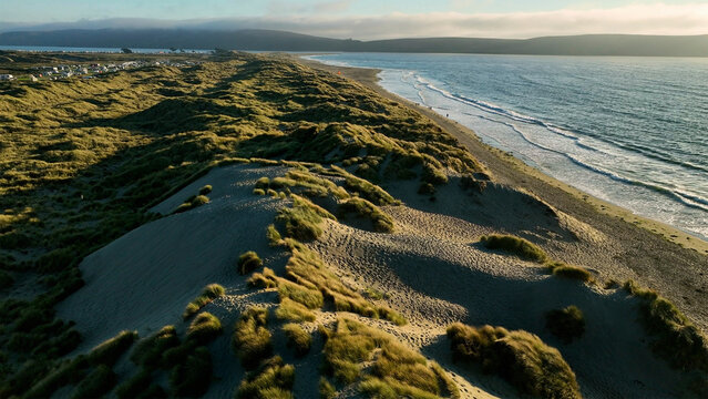Aerial view of scenic coastline with sandy beach and waves, Point Reyes, Dillon Beach, California, United States.