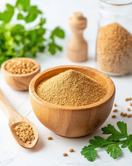 Fresh coriander powder in wooden bowl with seeds and herbs