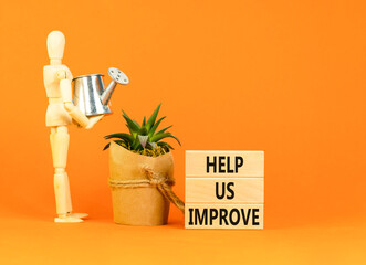 Help us improve symbol. Concept words Help us improve on beautiful wooden blocks. Beautiful orange...