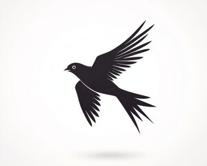 Obraz premium A Simple Black Silhouette of a Bird in Flight