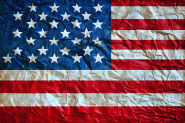 Сrumpled American flag showcasing its vibrant colors and iconic stars and stripes, symbolizing patriotism and national pride.