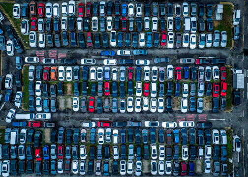 Aerial view of colorful rows of cars in a busy parking lot at Pasir Panjang Port, container terminal, PSA Singapore, Queenstown, South West Community Development Council, Singapore.