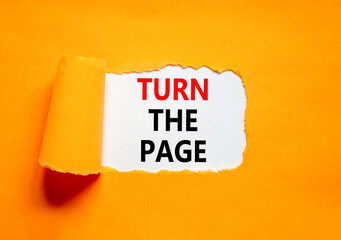Turn the page symbol. Concept words Turn the page on beautiful white paper. Beautiful orange paper background. Business motivational lifestyle turn the page concept. Copy space.