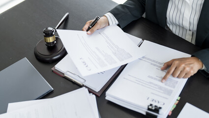 Lawyer businessman working with lawbook in office or courtroom Legal counsel with gavel and legal...