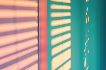 Fototapeta premium Sunlight streaming through window blinds, creating colorful shadows on wall