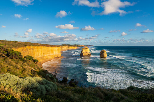 Stunning view of coastal monoliths known as The Twelve Apostles, in beautiful late afternoon light.