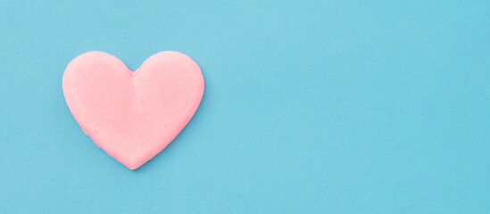 Fototapeta premium Hearts on a light blue background. 水色背景上のハート。ハートはお菓子。