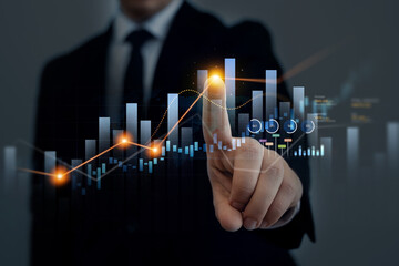 Analysis finance grow graph and market investment. Financial business plan,earnings,sale and...
