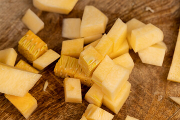 diced soft ripe pumpkin of orange color, fresh pumpkin for cooking