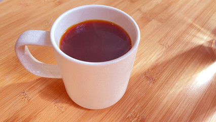 Warm earthy beverage enjoyed on a wooden table