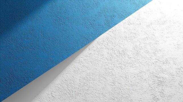 Blue and white textured wall with diagonal split and sunlight shadow.