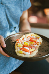 Sliced and served hawaiian mini pizza