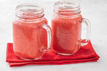 Fruit smoothie with cherry, banana and pineapple