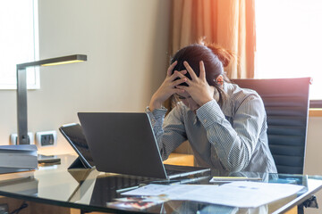 Panic attack working woman, stressful depressed student or businesswoman, burnout person with anxiety disorder mental health illness, headache and migraine, sitting in front of laptop computer desk