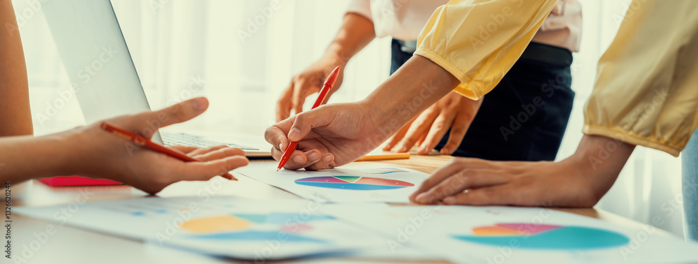 Aufkleber startup company employee working together, analyzing bi dashboard paper on financial data report and