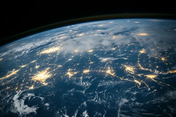 Obraz premium Earth from space showcasing city lights and cloud patterns at night over the ocean