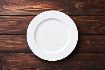 white plate on wooden dining table, showcasing simplicity and elegance. Perfect for serving meals or as decorative piece in rustic setting