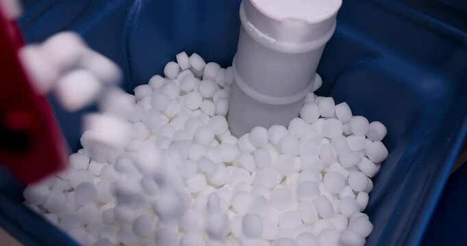 filling water softener with salt tablets