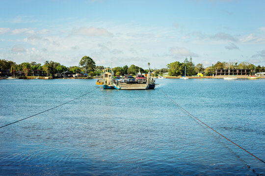 car ferry crossing the river