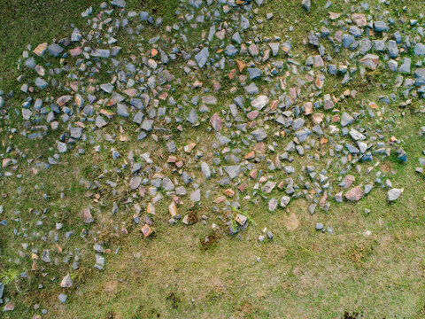Stones in grass to stop erosion of waterway