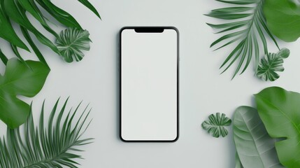 White cell phone is sitting on a leafy green background