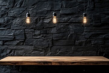 Rustic wooden tabletop illuminated by Edison bulbs against dark stone wall